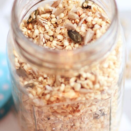 A close up to jar with toasted coconut muesli