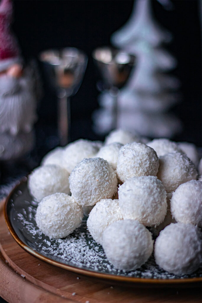 A plate of mini coconut bliss balls