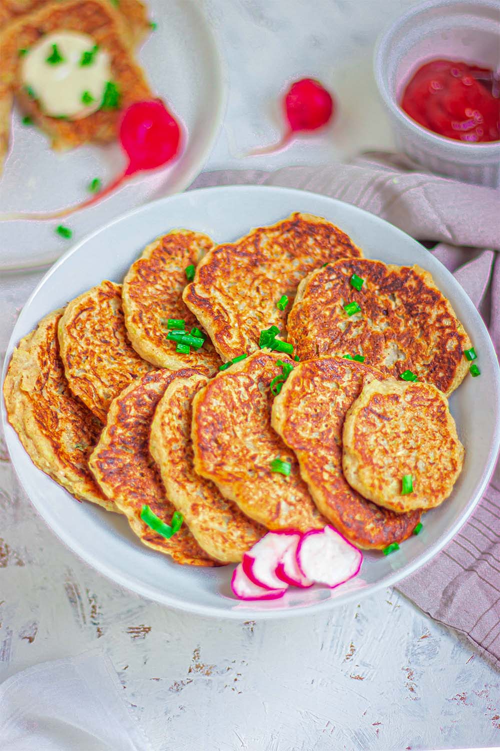 A bowl of vegan potato zucchini fritters