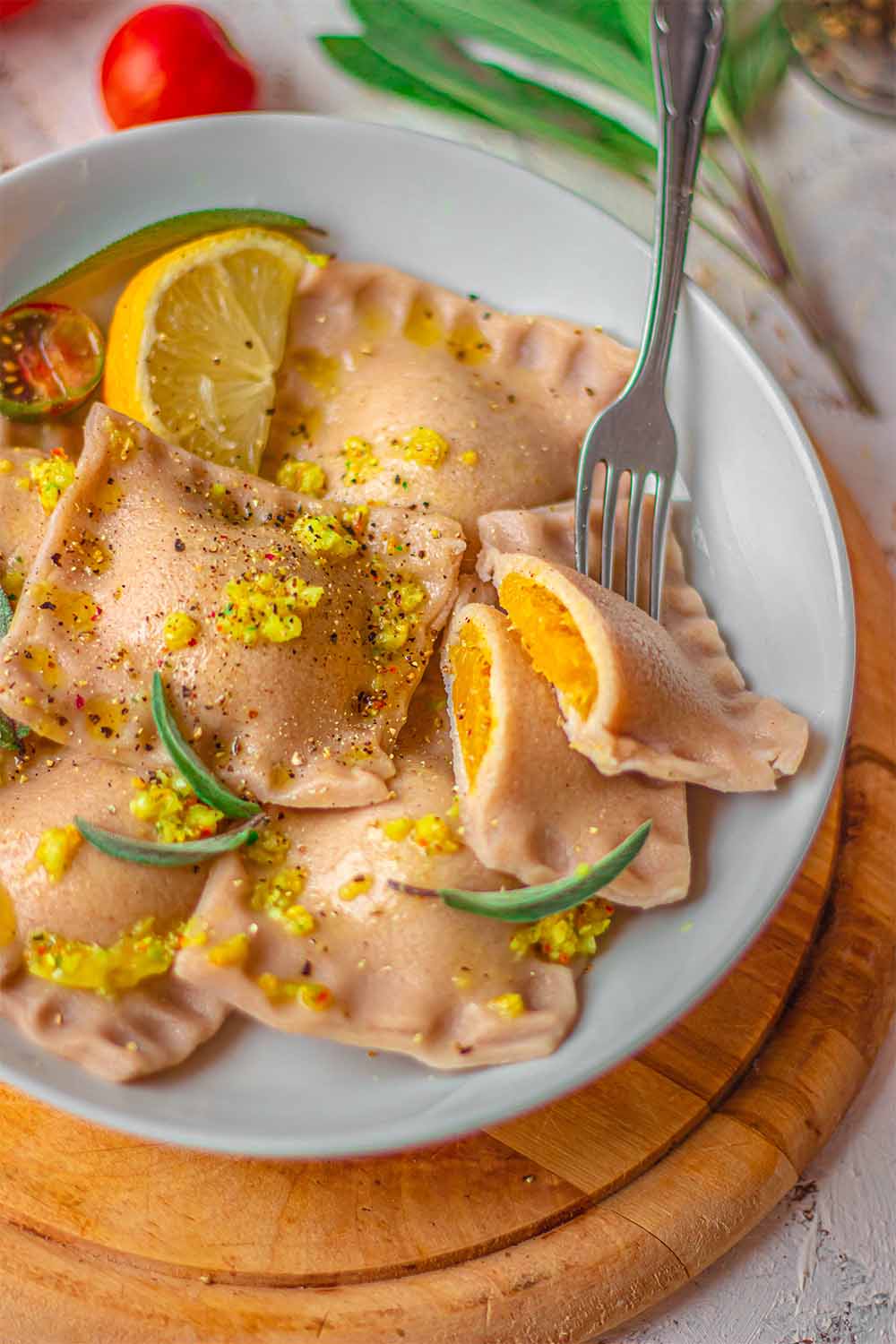Buckwheat flour pumpkin ravioli with garlic butter