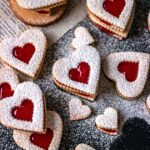 Linzer cookies dusted with powdered sugar