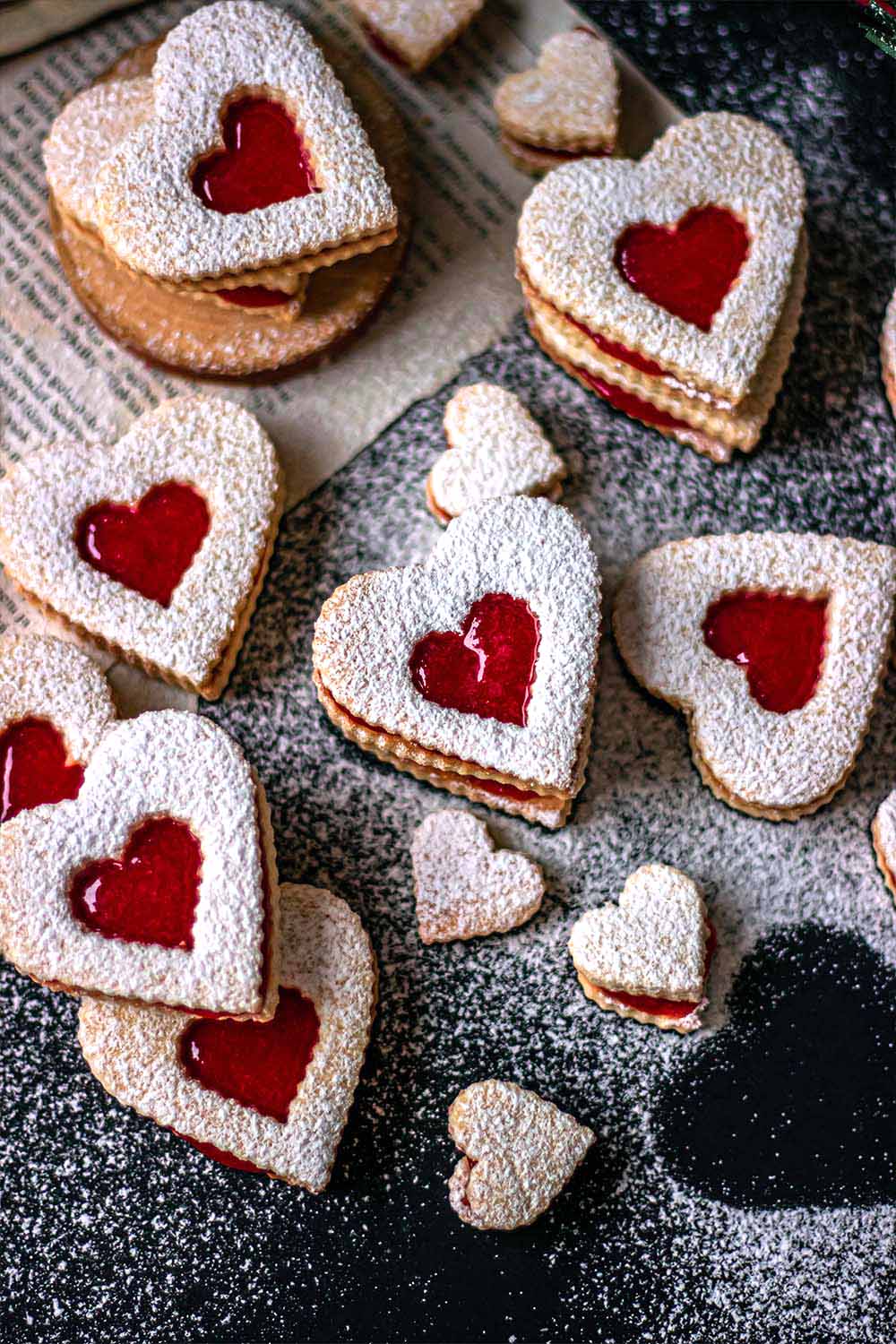 Linzer cookies dusted with powdered sugar